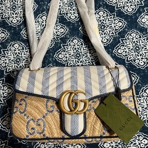 Gucci handbag never worn and tag is still on it.